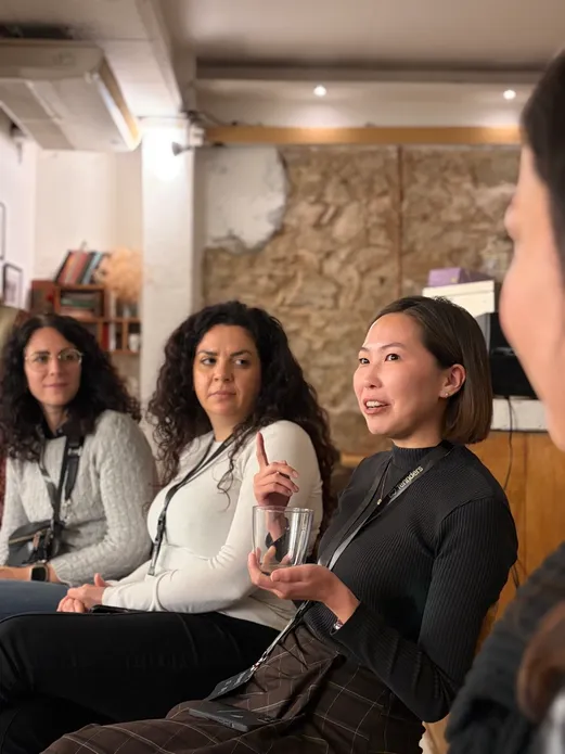 Members of the community listening at a Ladies in Product event.
